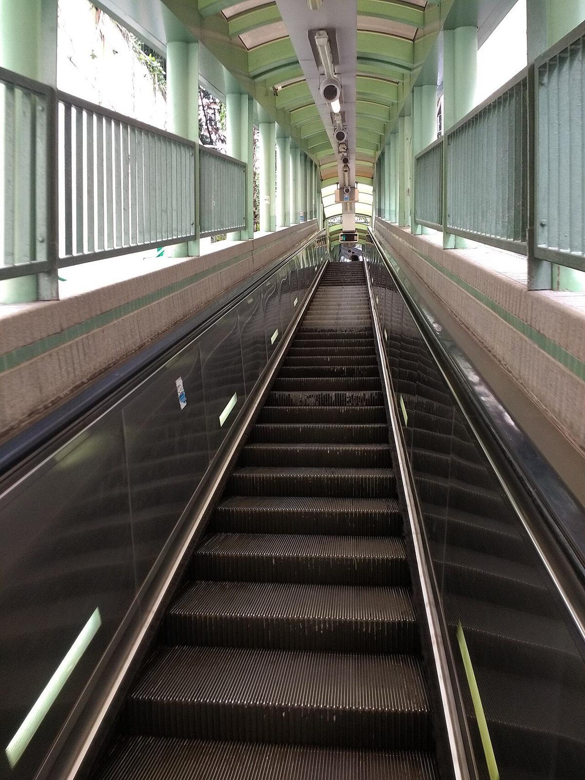 Inside the covered escalator system